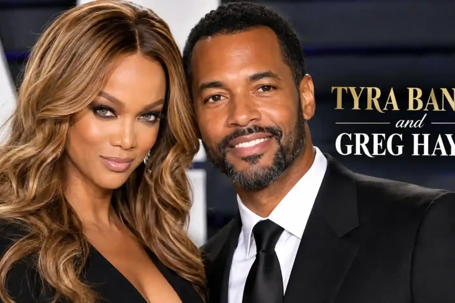 Tyra Banks and Greg Hayes posing together at a formal red carpet event in elegant black attire